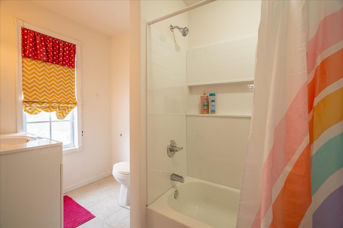 226 Nash Road Summertown, TN 38483 - Photo 33 of 55 a bathroom with a bathtub and a shower