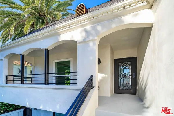 a view of a living room with a large window