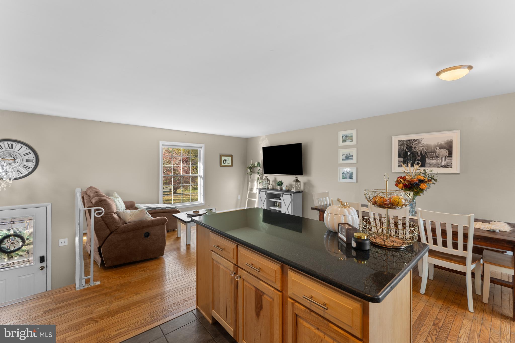 5057 Old Auburn Road Warrenton, VA 20187 - Photo 21 of 47 a living room with furniture and a flat screen tv