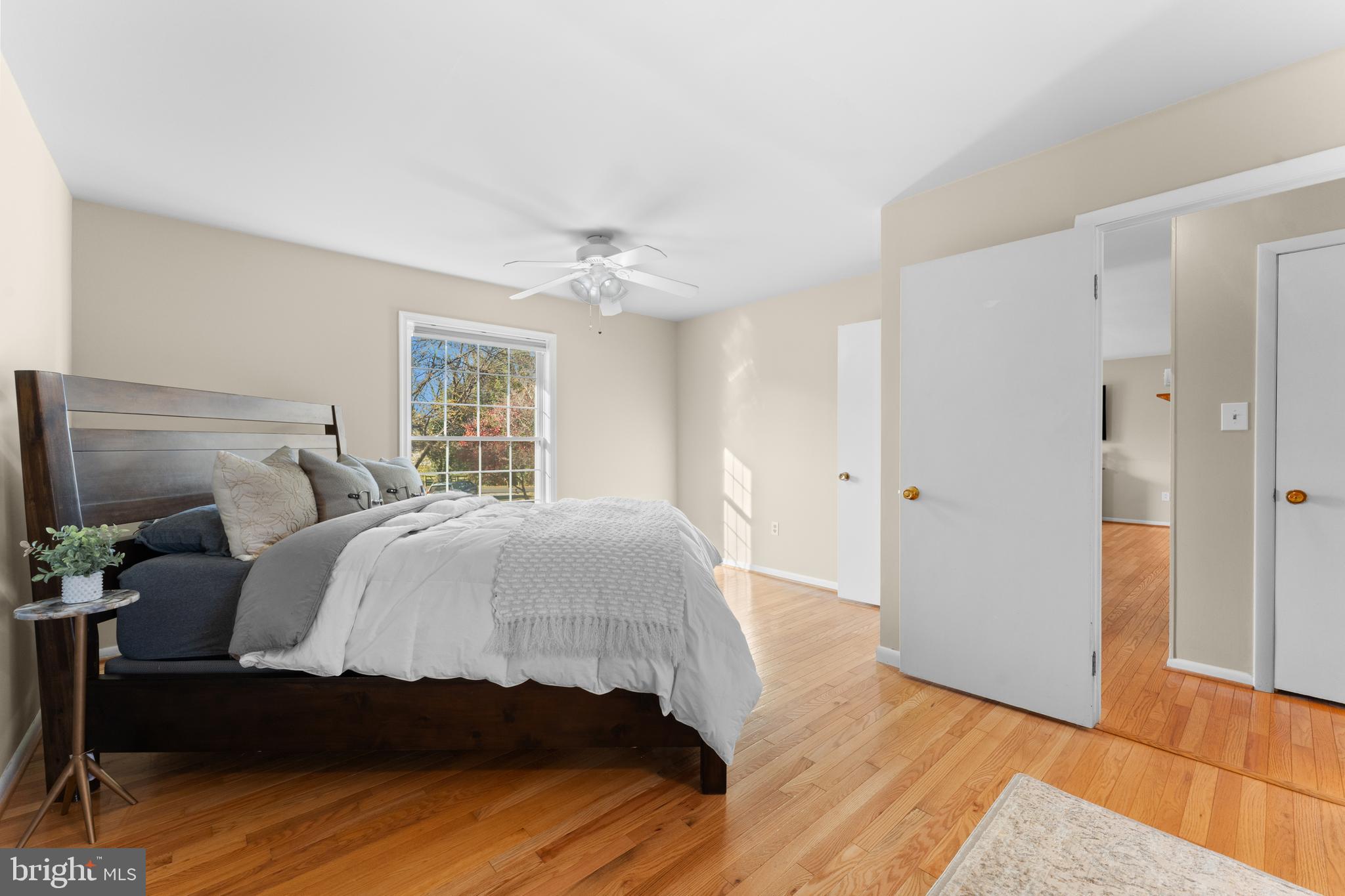 5057 Old Auburn Road Warrenton, VA 20187 - Photo 25 of 47 a spacious bedroom with a bed and a flat screen tv