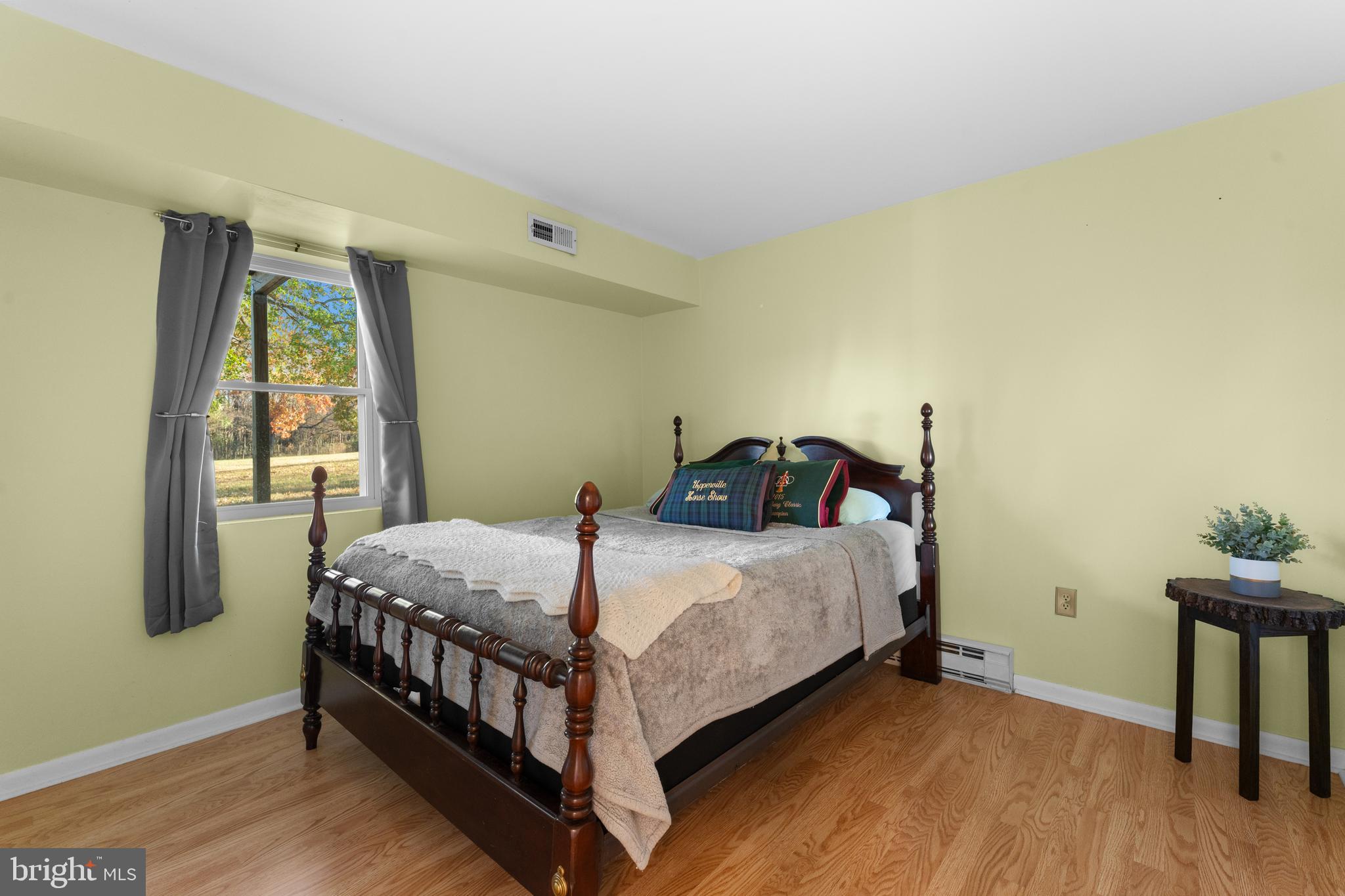 5057 Old Auburn Road Warrenton, VA 20187 - Photo 36 of 47 a bed sitting in a bedroom next to a window