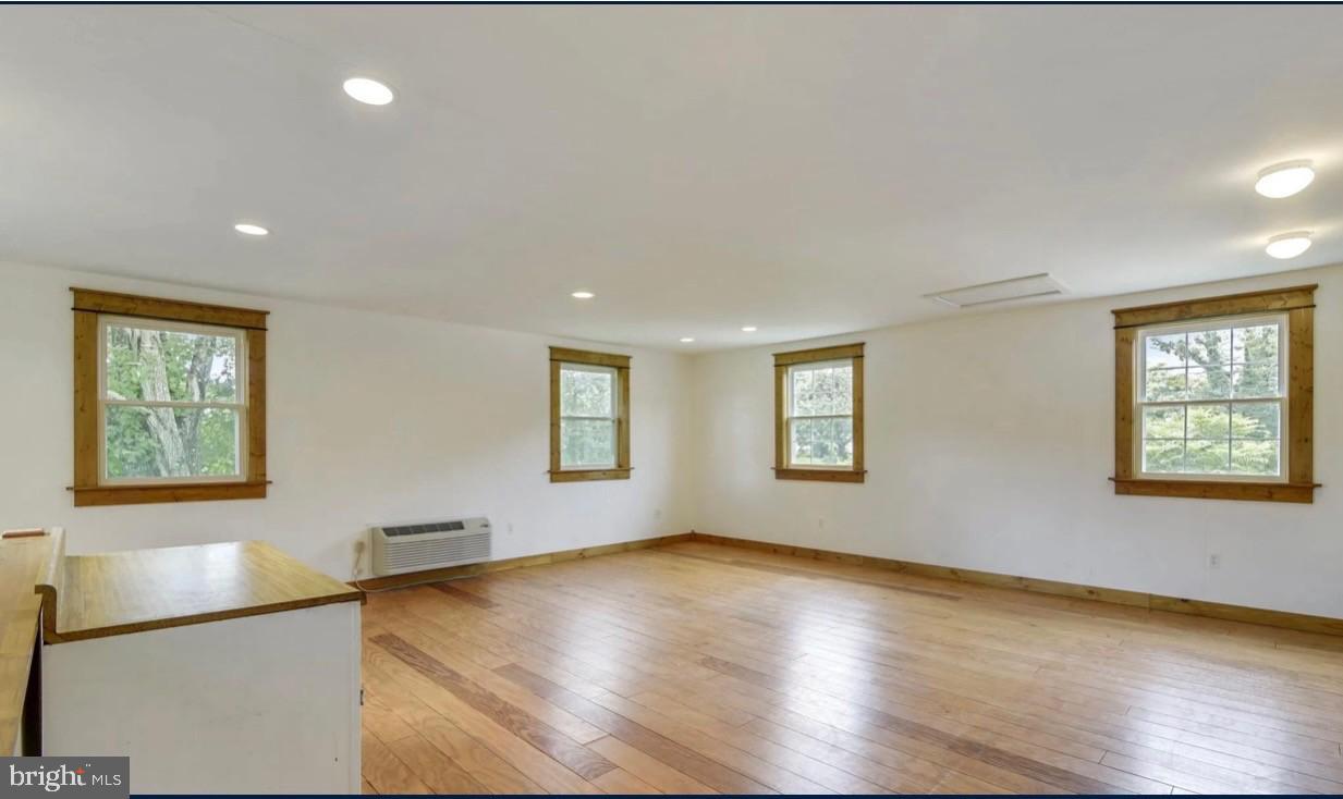 5057 Old Auburn Road Warrenton, VA 20187 - Photo 39 of 47 a view of empty room with wooden floor and fan