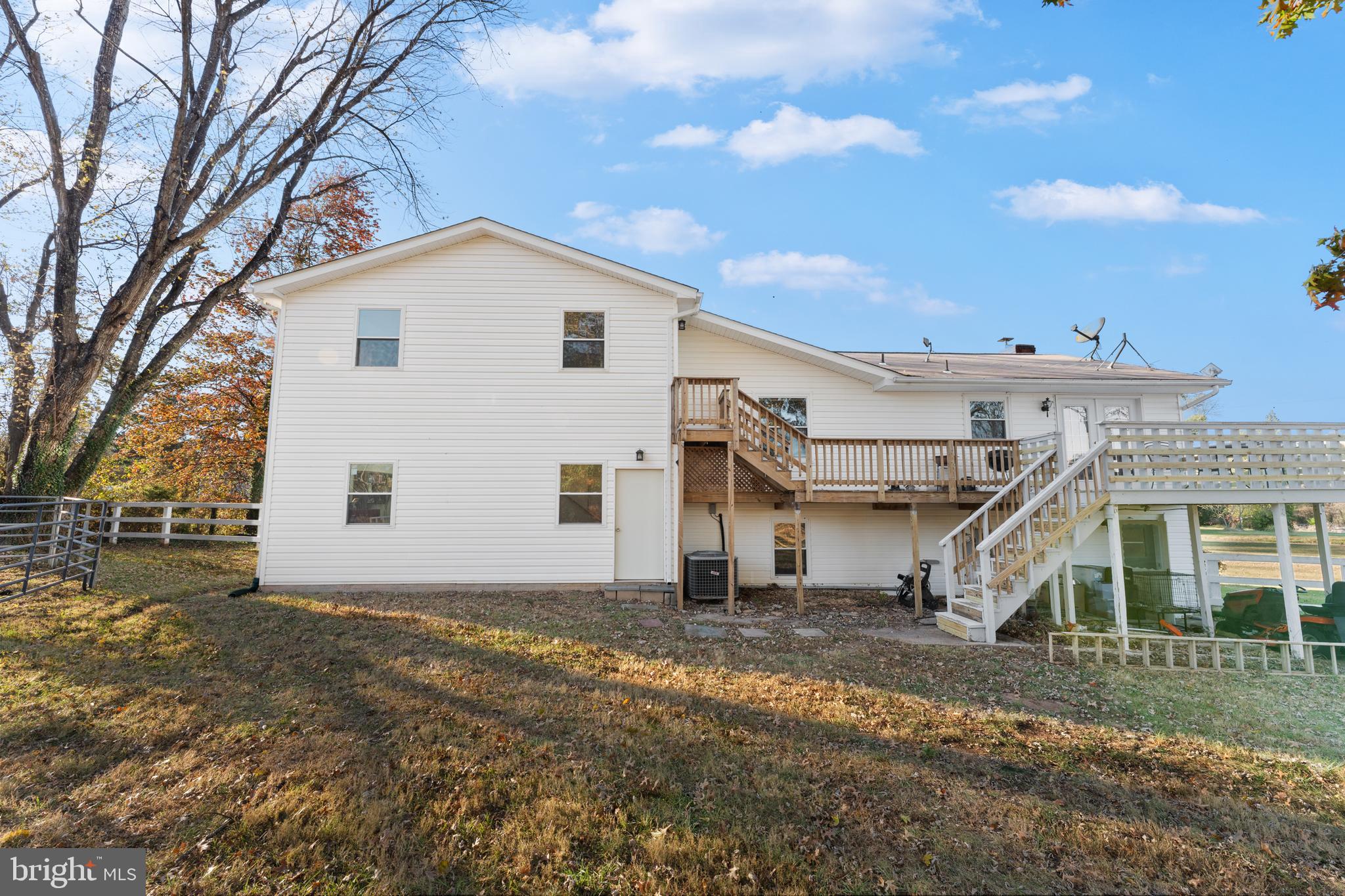 5057 Old Auburn Road Warrenton, VA 20187 - Photo 41 of 47 a view of a house with a backyard