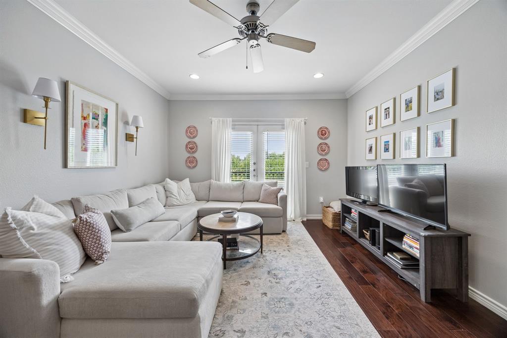 3102 Kings Road, Unit 1211 Dallas, TX 75219 - Photo 1 of 27 Living area featuring wood-finish flooring, crown molding, recessed lighting, and a ceiling fan