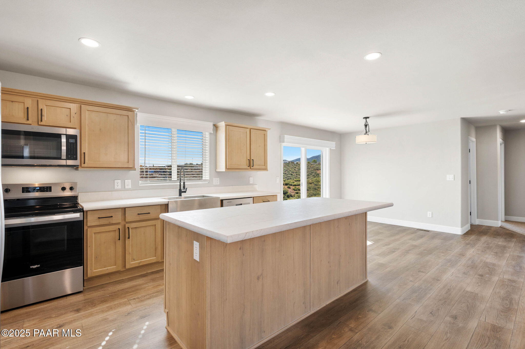 9815 East Ringold Road Dewey, AZ 86327 - Photo 13 of 25 a kitchen with a sink stove top oven and refrigerator