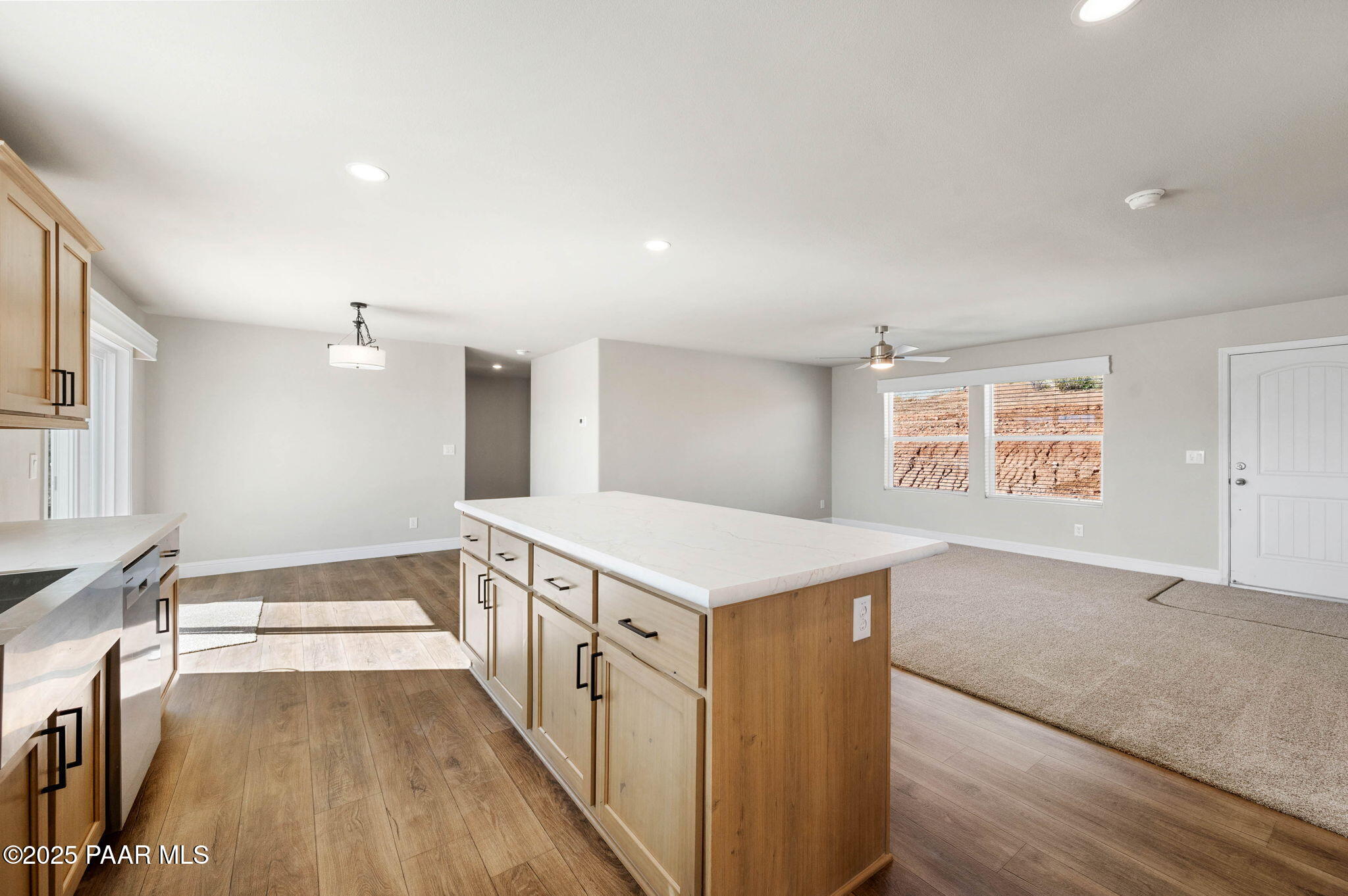 9815 East Ringold Road Dewey, AZ 86327 - Photo 14 of 25 a view of a kitchen island wooden floor