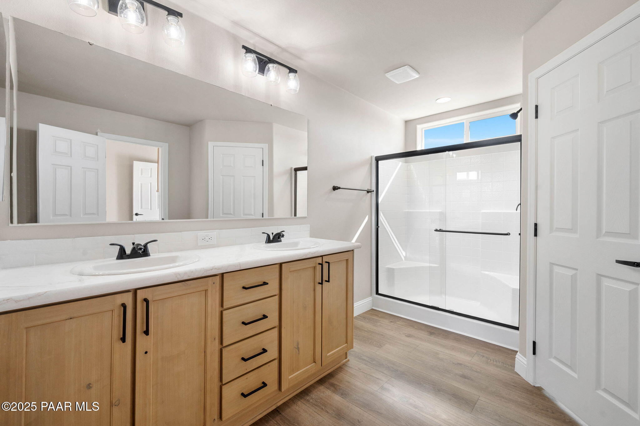 9815 East Ringold Road Dewey, AZ 86327 - Photo 22 of 25 a bathroom with a granite countertop sink mirror and a