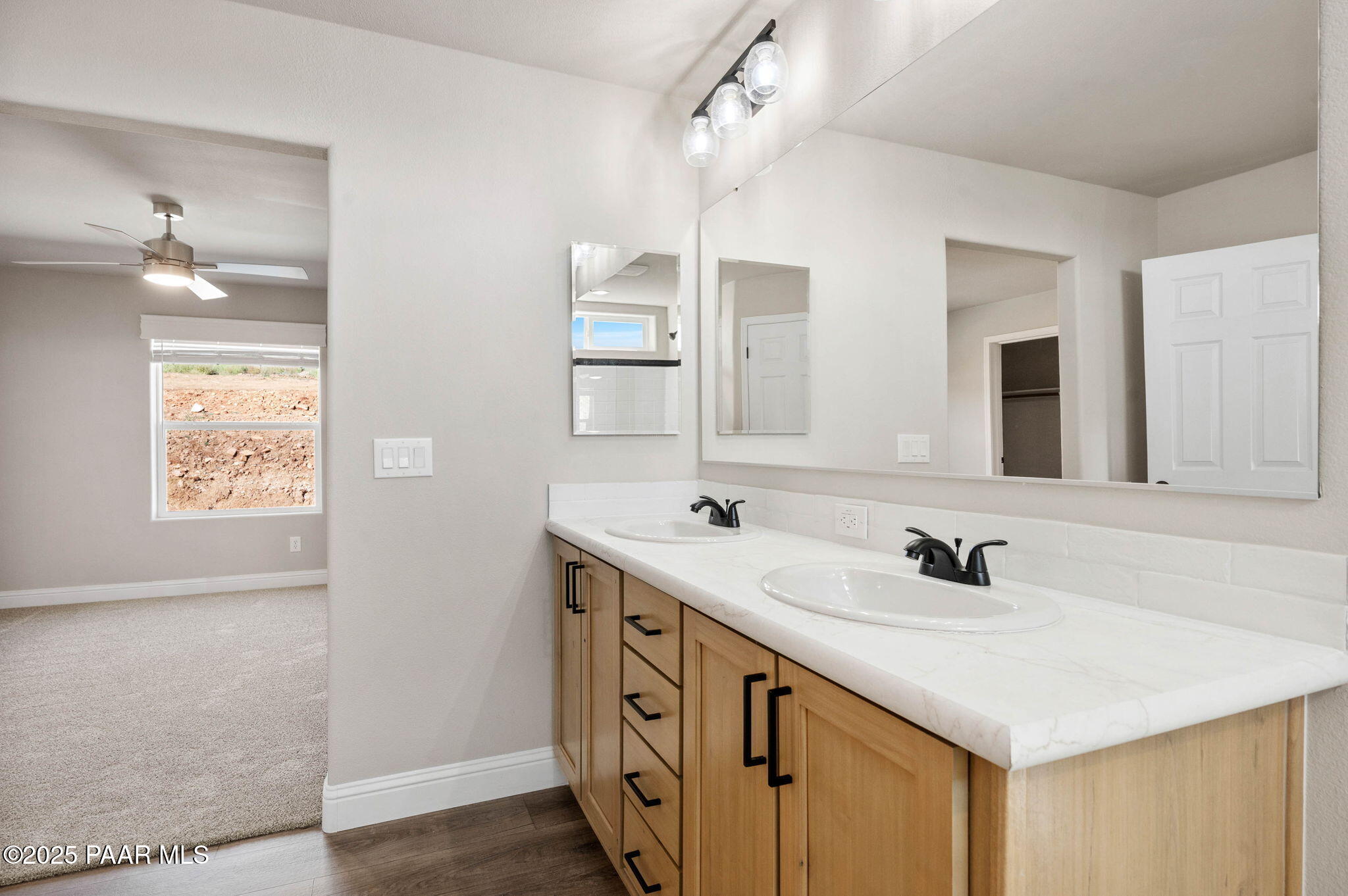 9815 East Ringold Road Dewey, AZ 86327 - Photo 23 of 25 a bathroom with a sink and a mirror