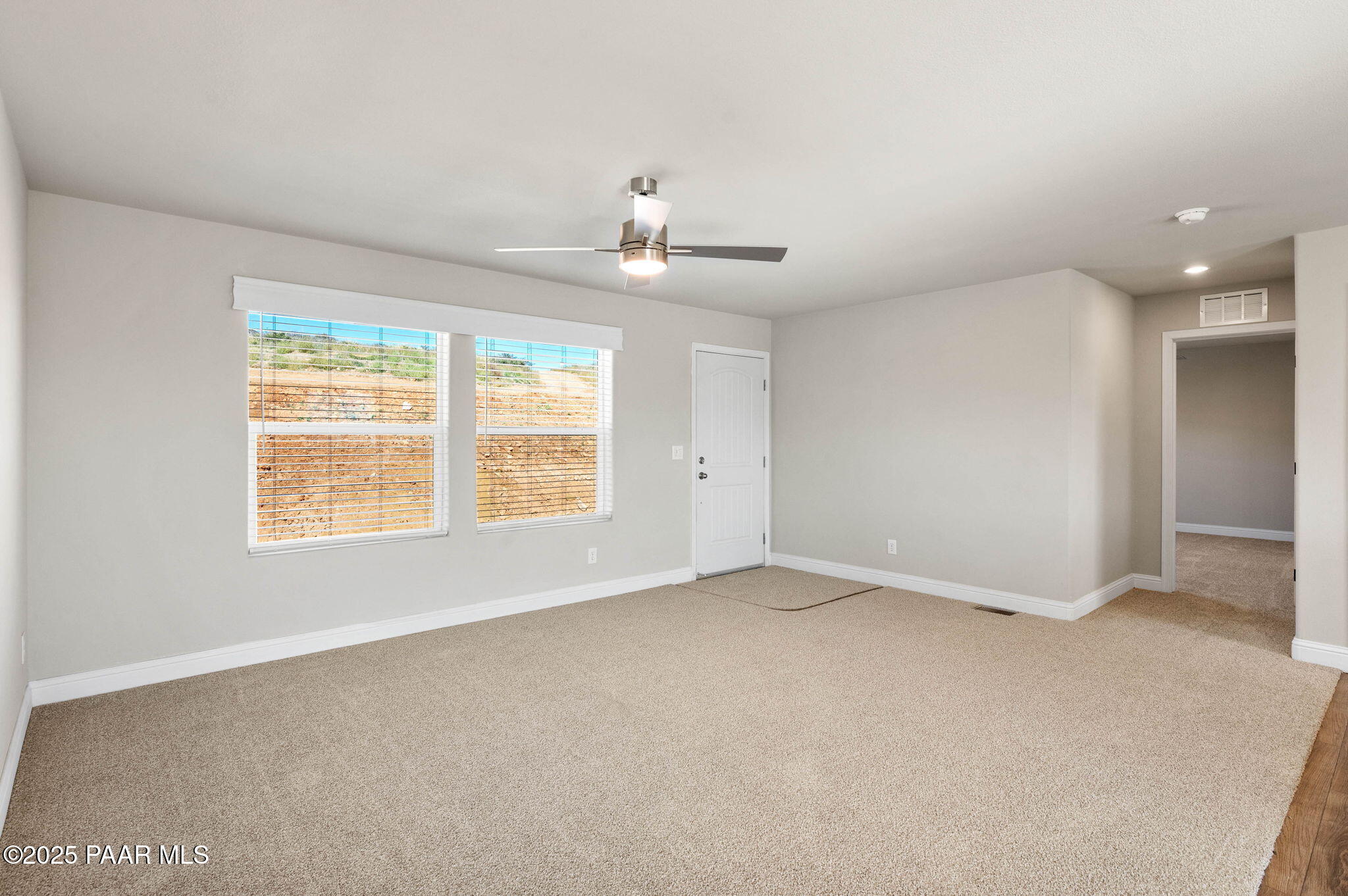 9815 East Ringold Road Dewey, AZ 86327 - Photo 7 of 25 a view of an empty room with a window