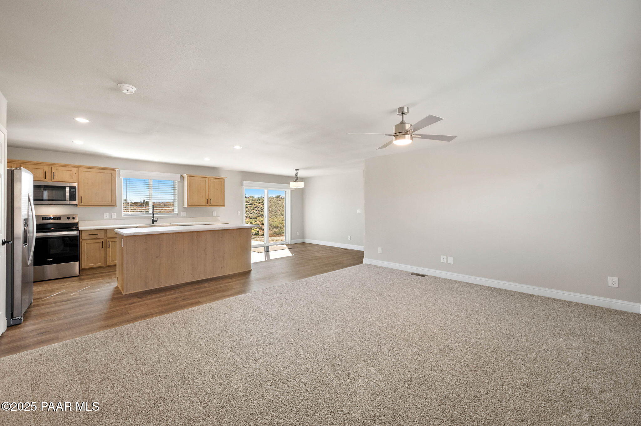 9815 East Ringold Road Dewey, AZ 86327 - Photo 9 of 25 a large white kitchen with a sink
