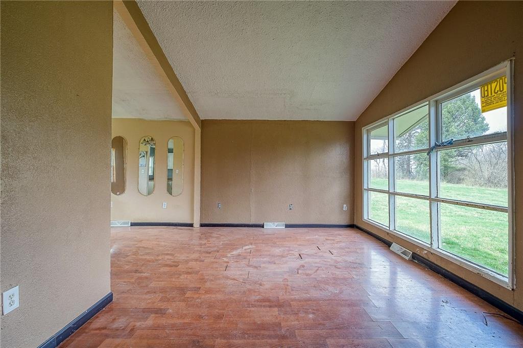 81 Ewing Road McKees Rocks, PA 15136 - Photo 4 of 14 an empty room with windows