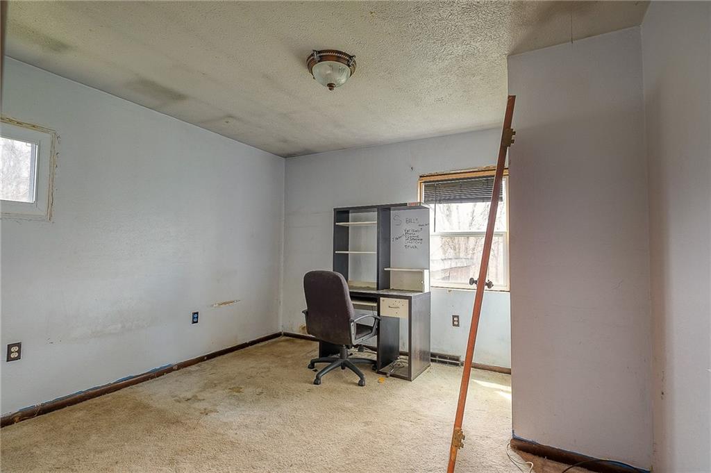 81 Ewing Road McKees Rocks, PA 15136 - Photo 8 of 14 a view of a workspace with furniture and a window