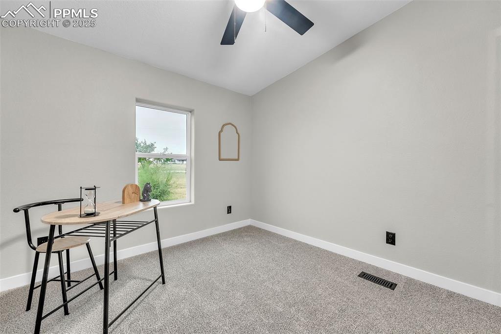 6185 Night Train Lane Yoder, CO 80864 - Photo 26 of 38 a workspace with furniture and window