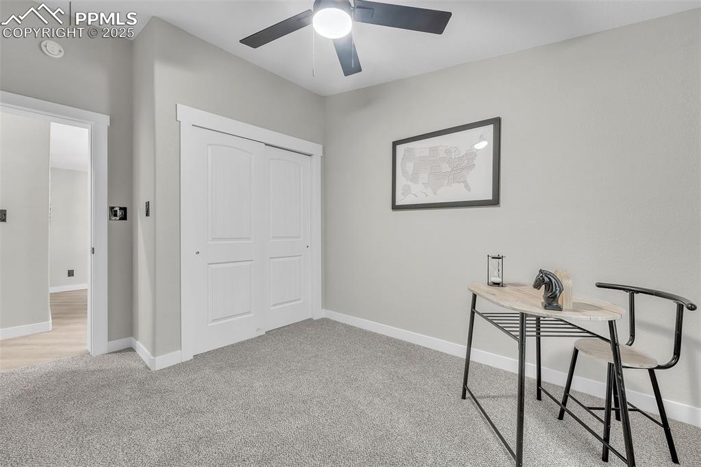 6185 Night Train Lane Yoder, CO 80864 - Photo 27 of 38 a view of room with workspace