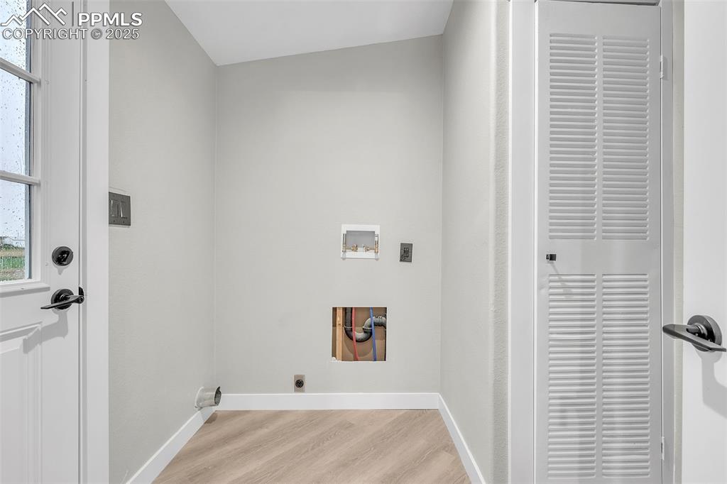 6185 Night Train Lane Yoder, CO 80864 - Photo 33 of 38 a view of a hallway with entryway door