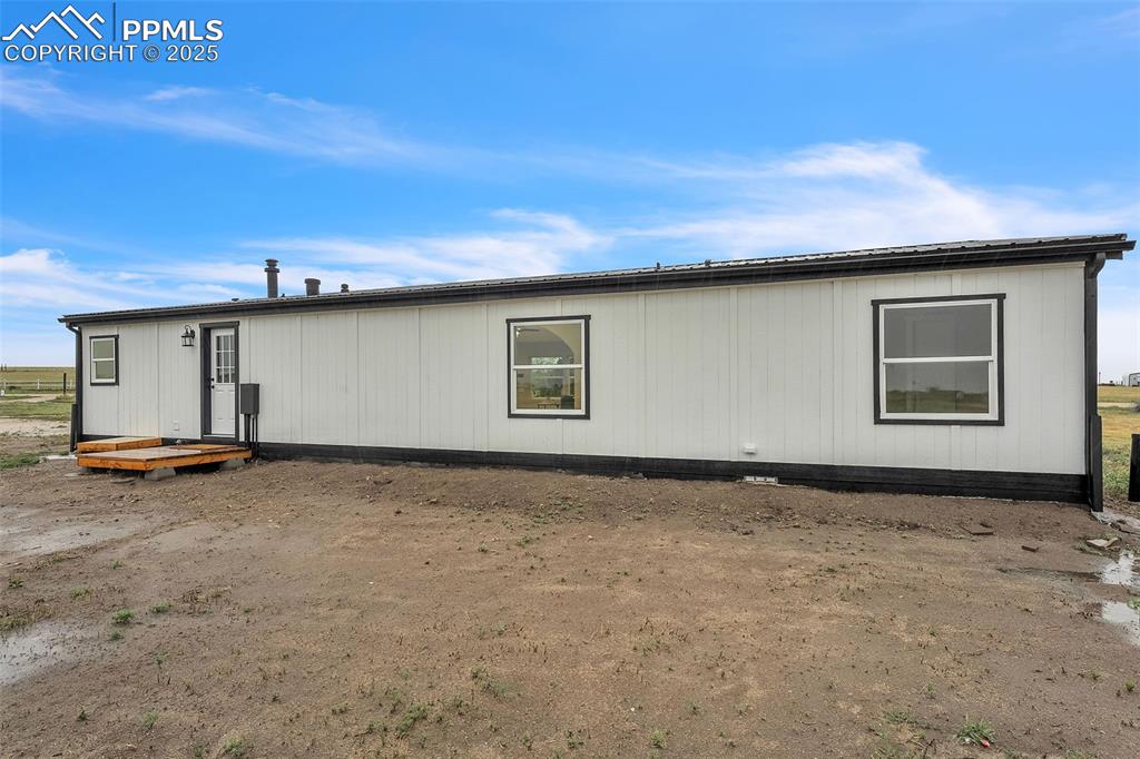 6185 Night Train Lane Yoder, CO 80864 - Photo 38 of 38 a backyard of a house