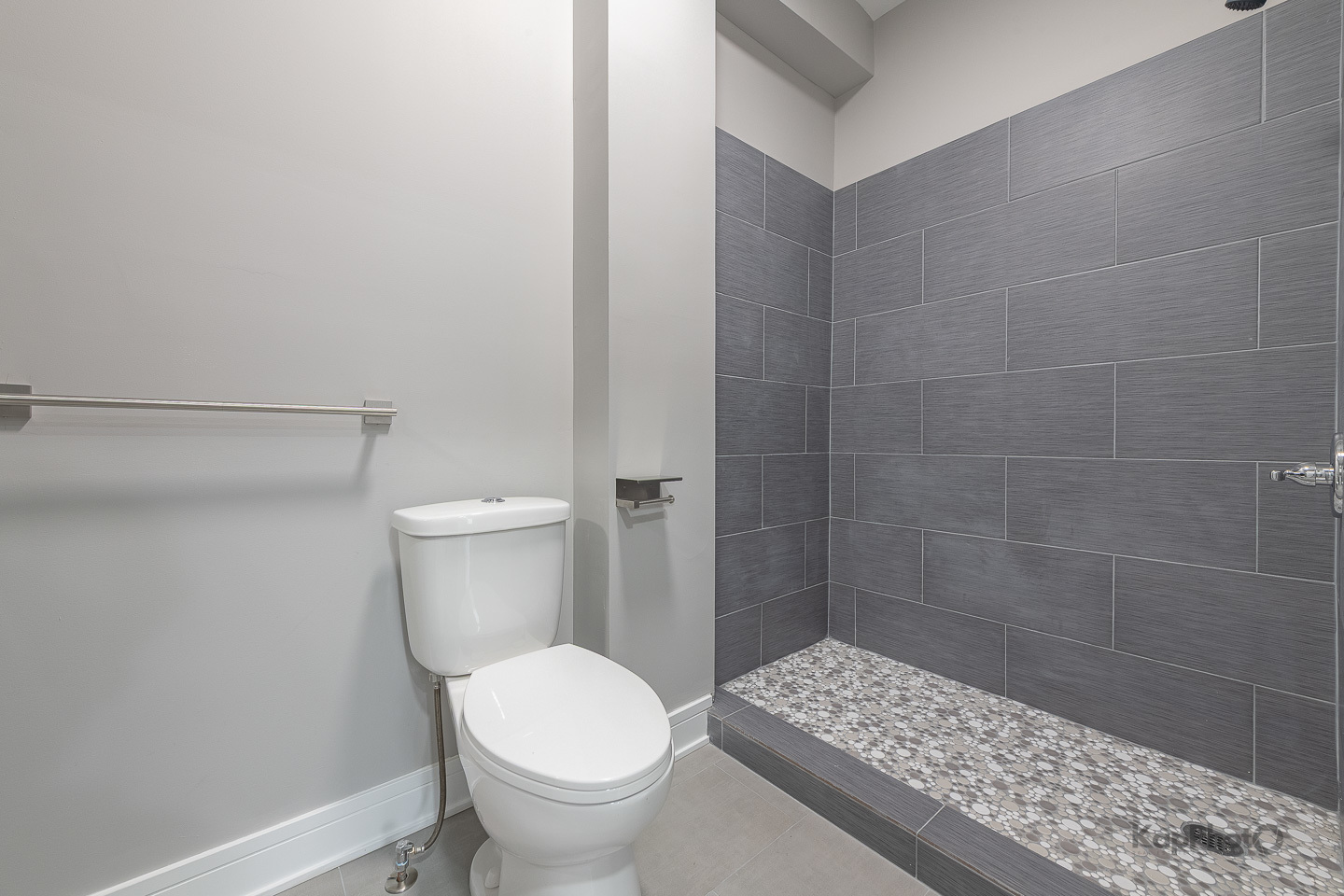 3044 West Irving Park Road Chicago, IL 60618 - Photo 26 of 37 a bathroom with a sink and a toilet