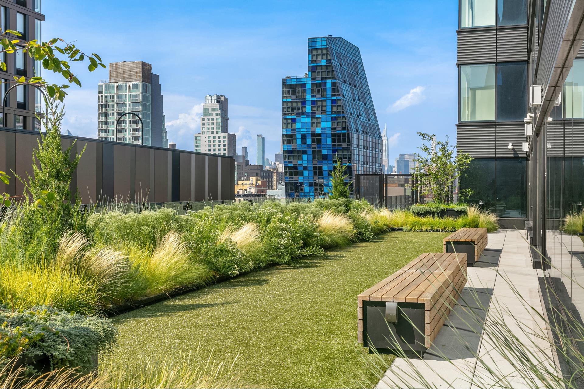 202 Broome Street, Unit 6F Manhattan, NY 10002 - Photo 16 of 19 a view of swimming pool outdoor seating and city view
