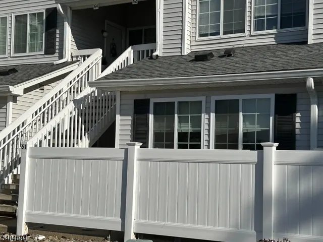a front view of a house with a porch