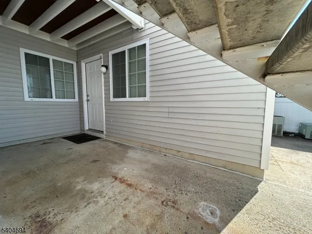 a view of a house with white door