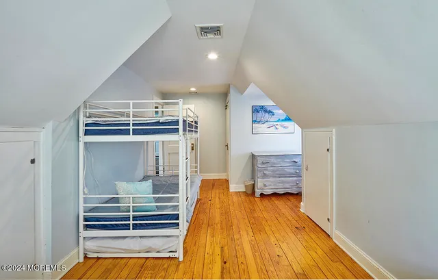 a view of room with window and cabinet