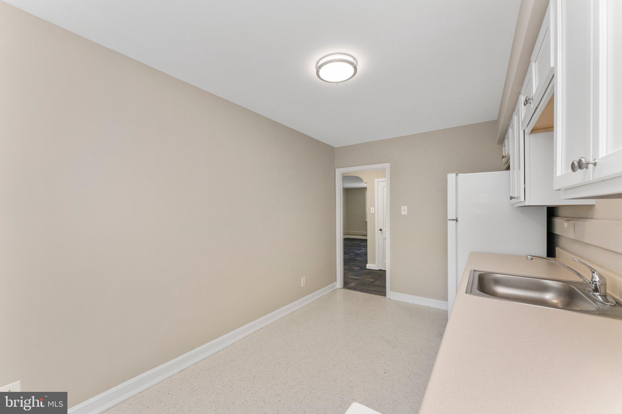 5346 Chew Avenue, Unit 2A Philadelphia, PA 19138 - Photo 13 of 17 a view of a kitchen with a sink