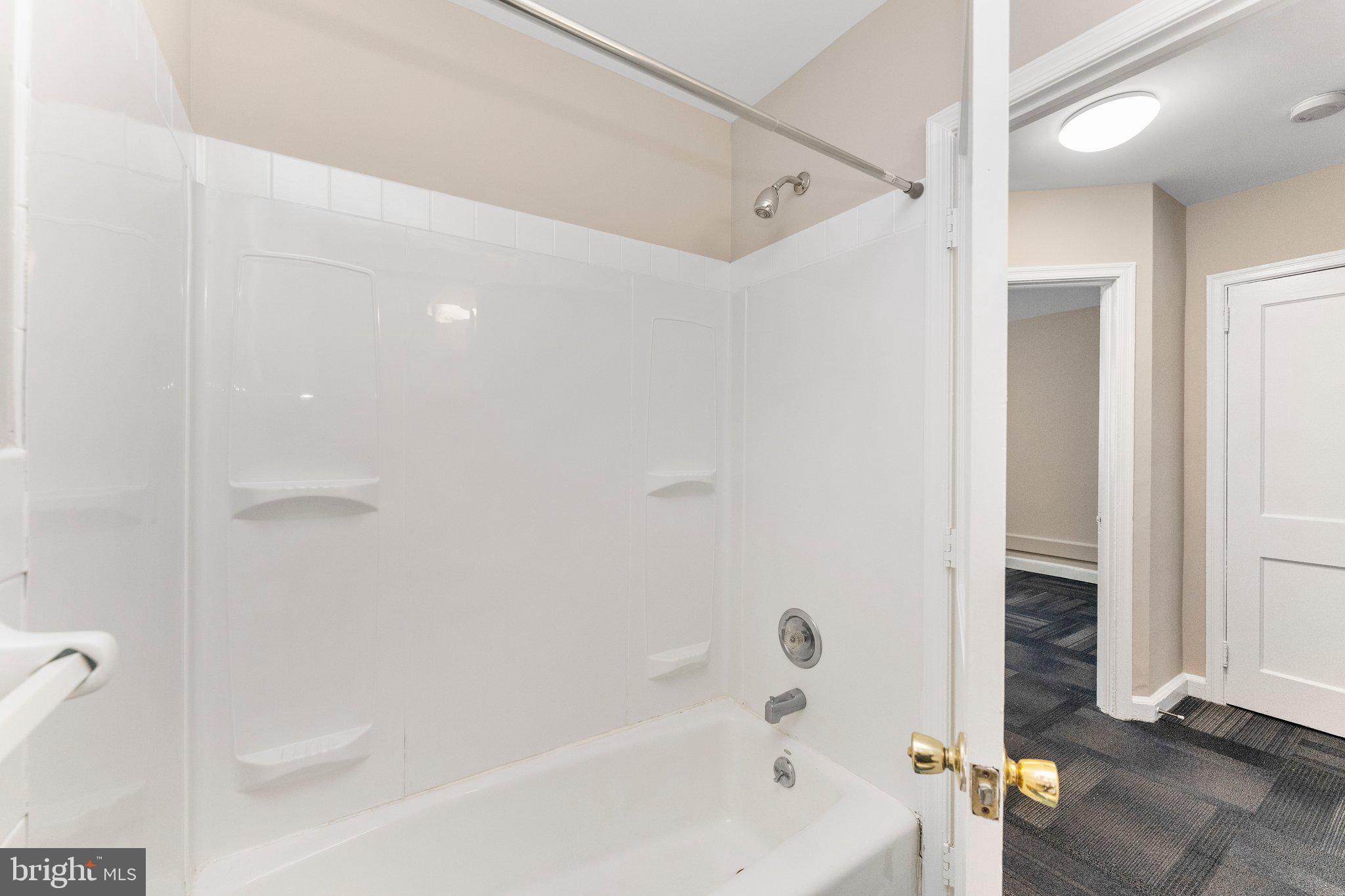 5346 Chew Avenue, Unit 2A Philadelphia, PA 19138 - Photo 17 of 17 a bathroom with a bathtub