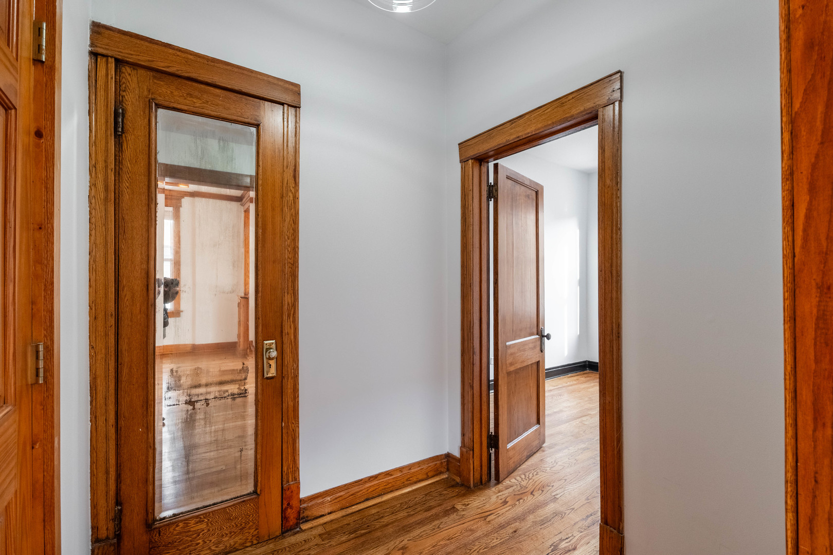 2842 West Augusta Boulevard, Unit 2E Chicago, IL 60622 - Photo 14 of 23 a view of a hallway with wooden floor
