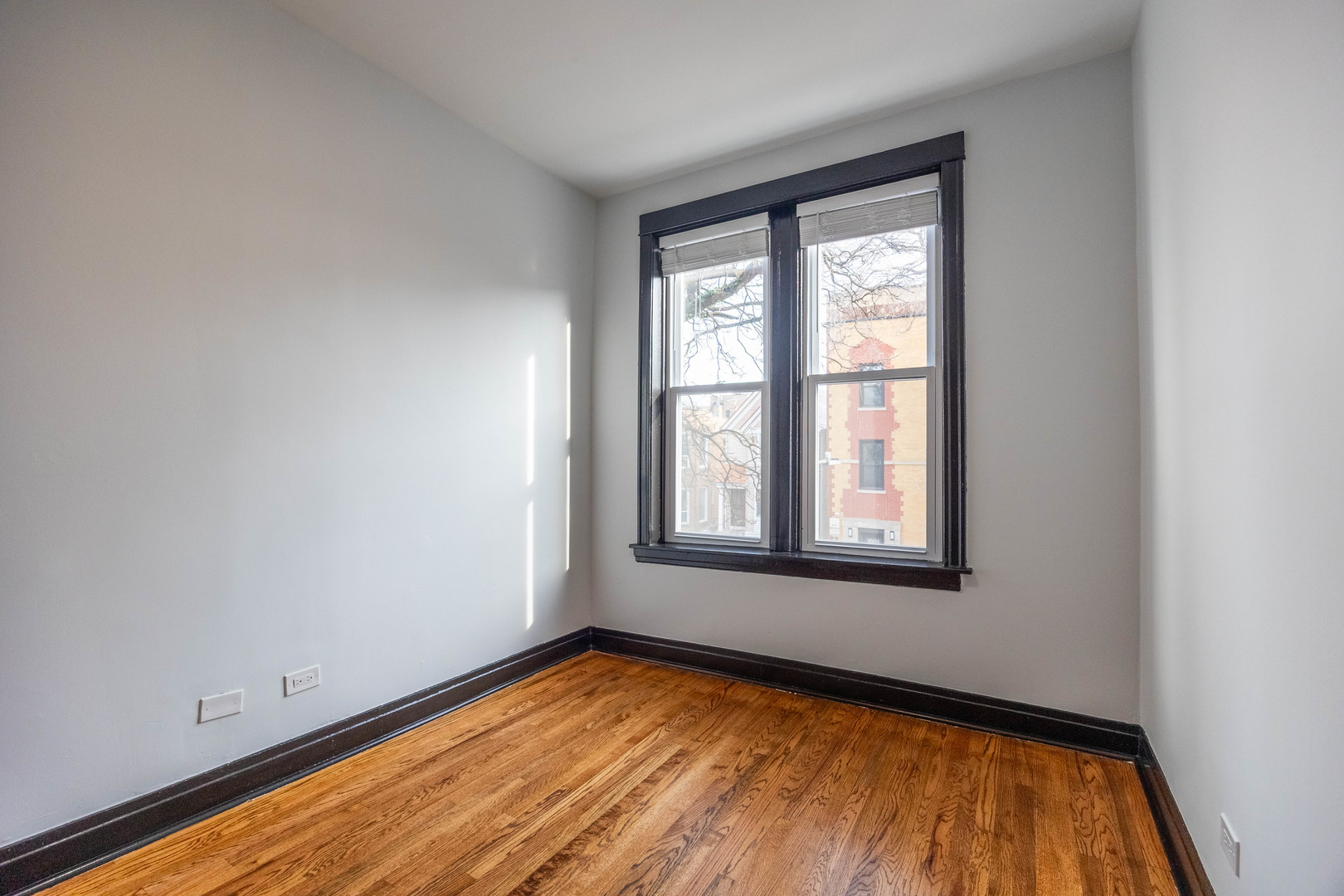 2842 West Augusta Boulevard, Unit 2E Chicago, IL 60622 - Photo 15 of 23 a view of empty room with window