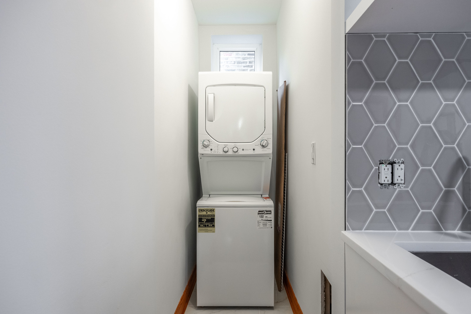2842 West Augusta Boulevard, Unit 2E Chicago, IL 60622 - Photo 23 of 23 a utility room with a sink dryer and washer