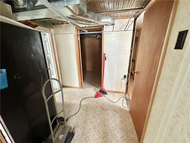 a bathroom with a tub and a shower