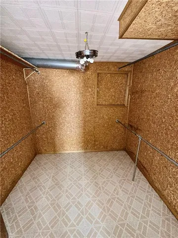 a view of empty room with windows