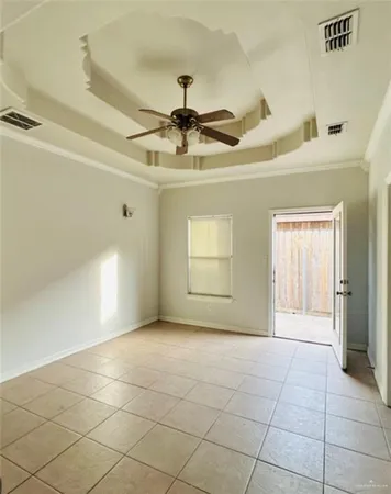 a view of an empty room and window