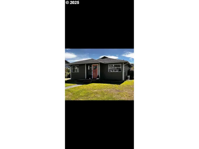 a picture of a bench in the side of a building