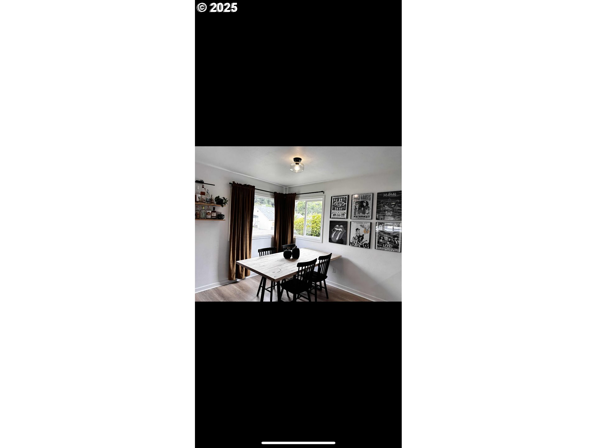 2136 Greenwood Avenue Reedsport, OR 97467 - Photo 13 of 20 a living room with furniture and a flat screen tv