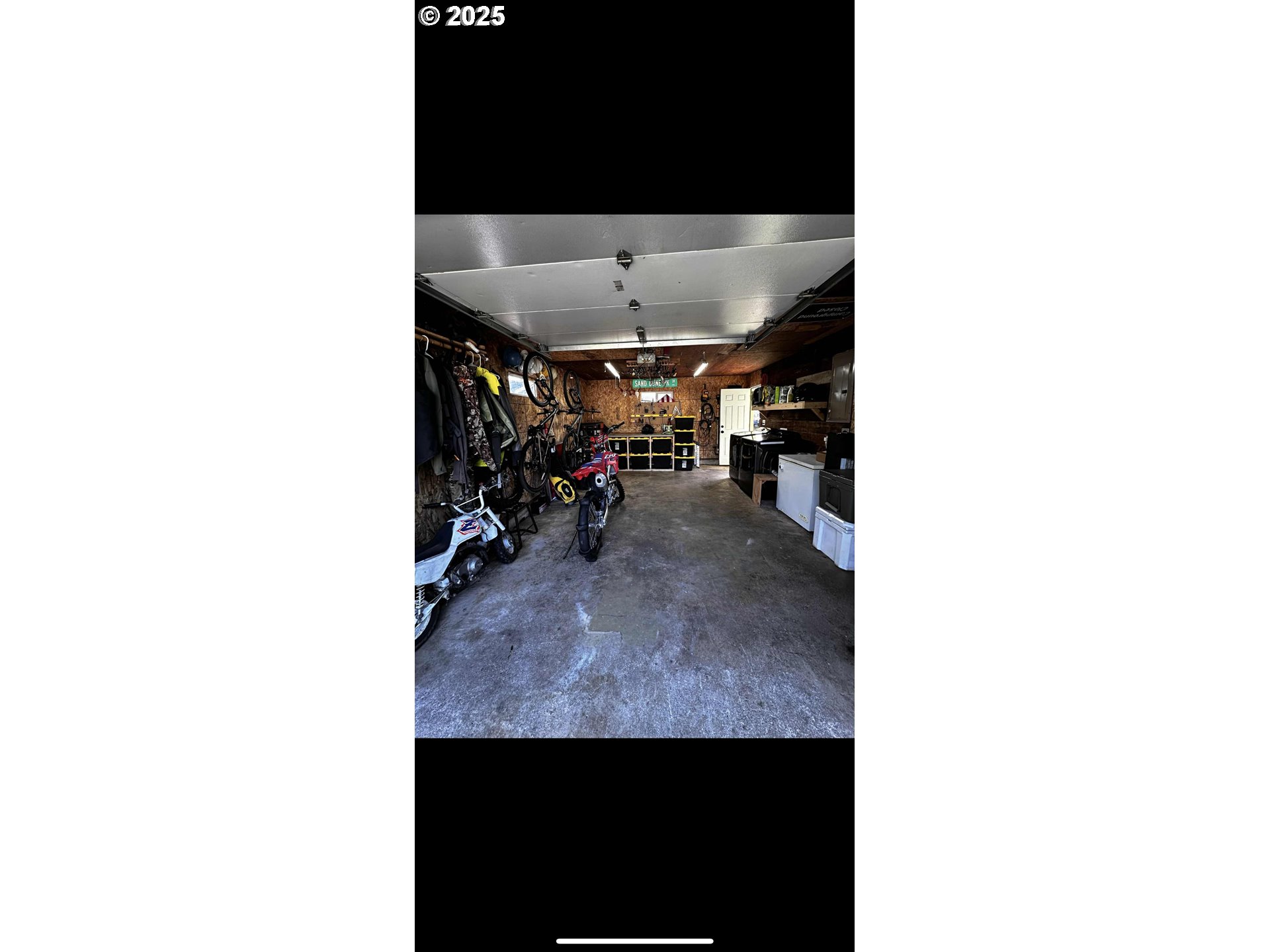 2136 Greenwood Avenue Reedsport, OR 97467 - Photo 3 of 20 a view of a living room with a table and a potted plant