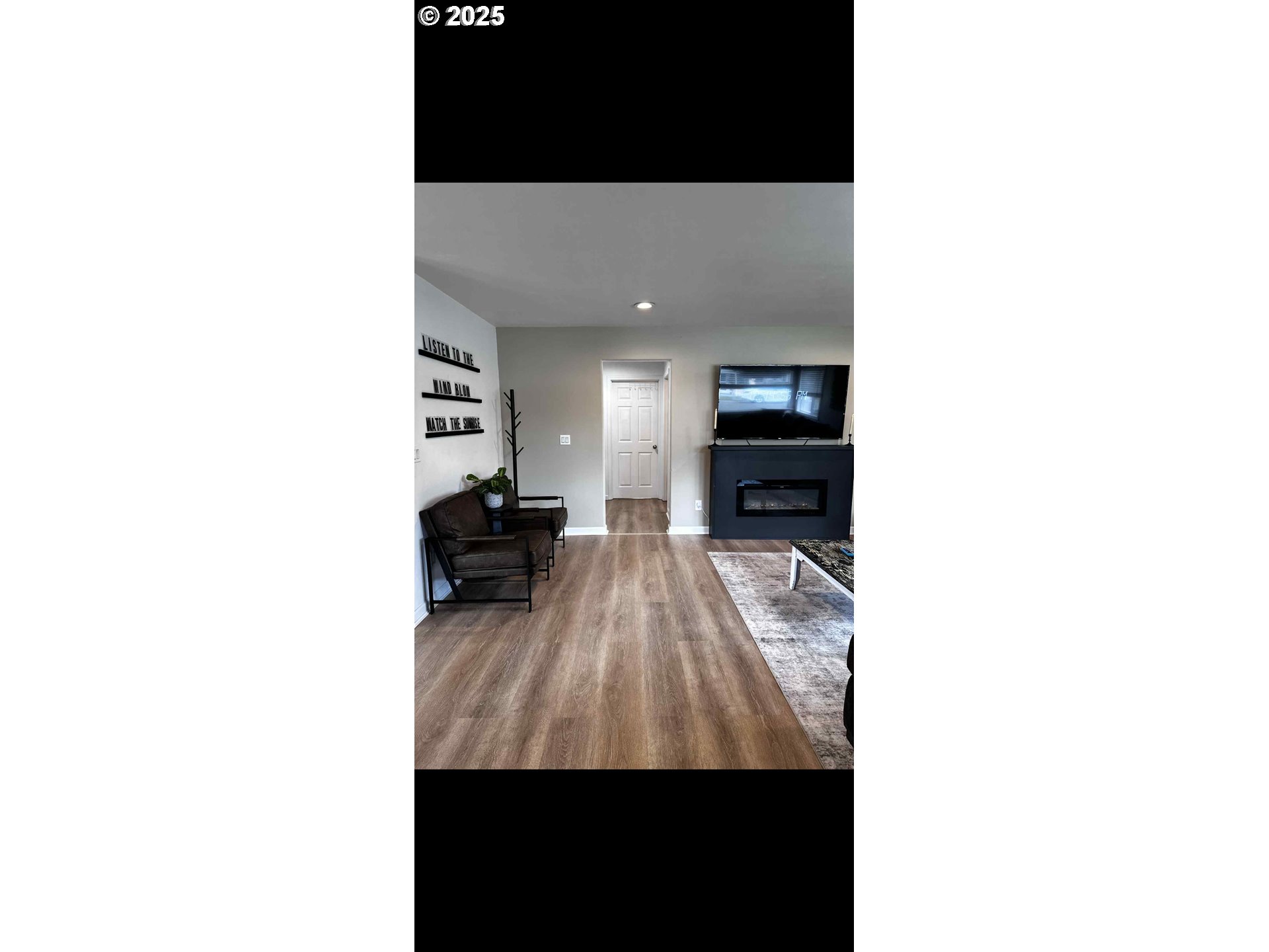 2136 Greenwood Avenue Reedsport, OR 97467 - Photo 8 of 20 a living room with furniture and a wooden floor