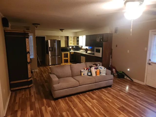 a living room with furniture and a couch