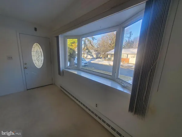 a view of a hallway with window