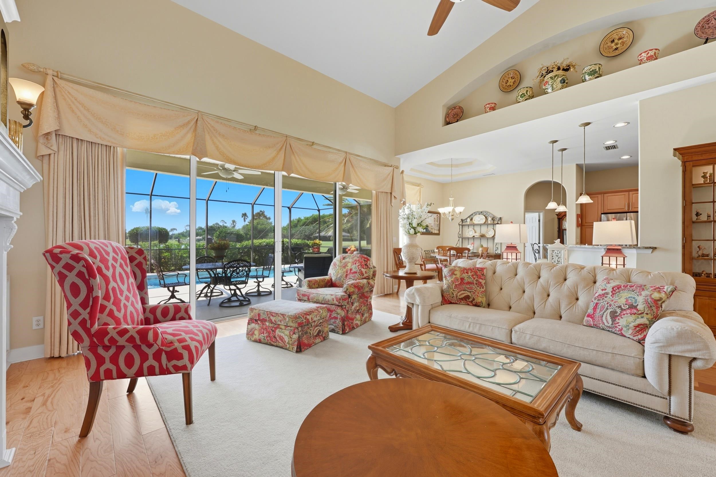 305 Marsh Point Circle St. Augustine, FL 32080 - Photo 11 of 82 a living room with furniture a large window and a rug