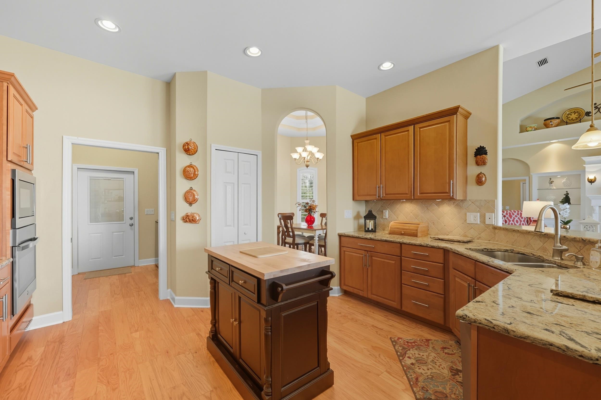 305 Marsh Point Circle St. Augustine, FL 32080 - Photo 16 of 82 a kitchen with a sink stove and cabinets