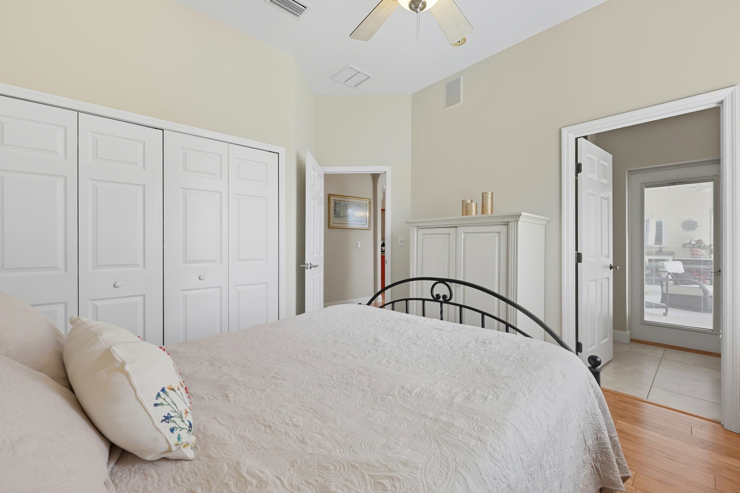 305 Marsh Point Circle St. Augustine, FL 32080 - Photo 33 of 82 Bedroom with a closet, ceiling fan, and light wood-type flooring