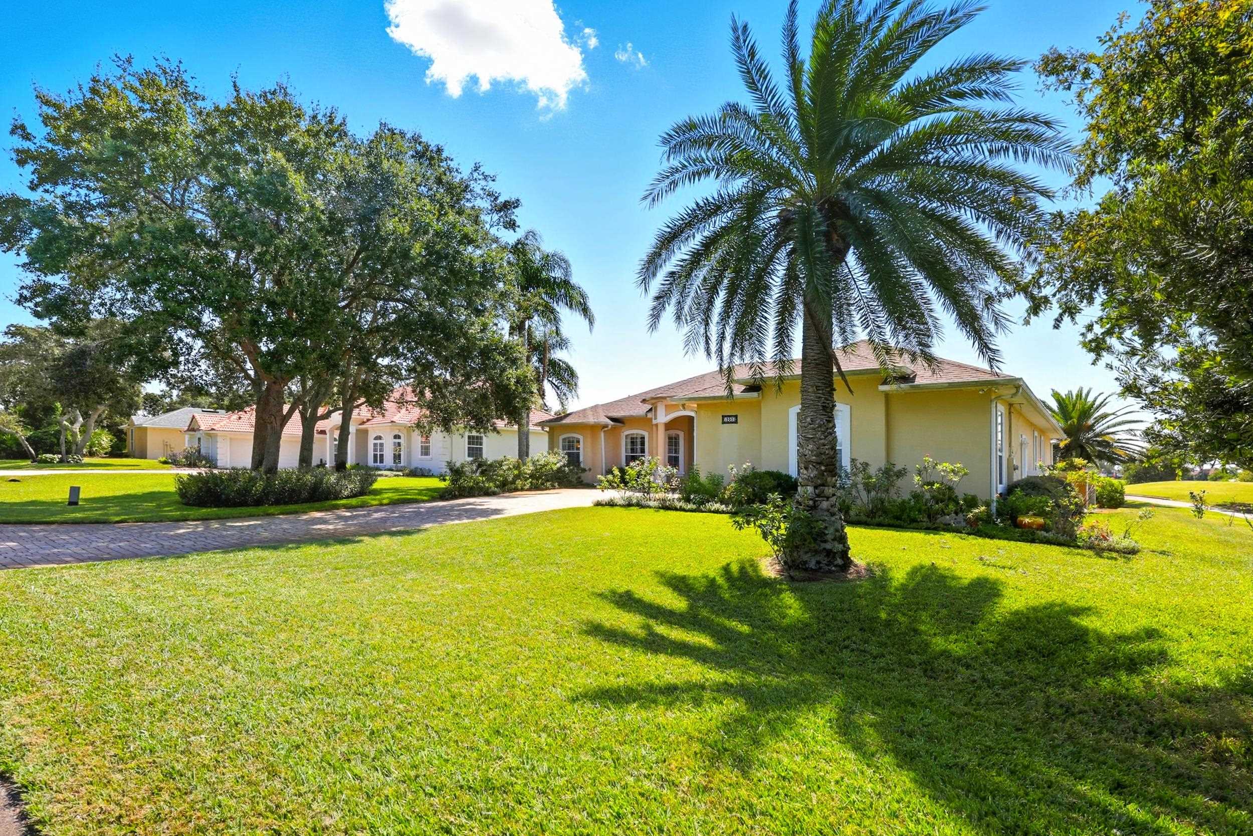305 Marsh Point Circle St. Augustine, FL 32080 - Photo 56 of 82 a front view of house with swimming pool and green space