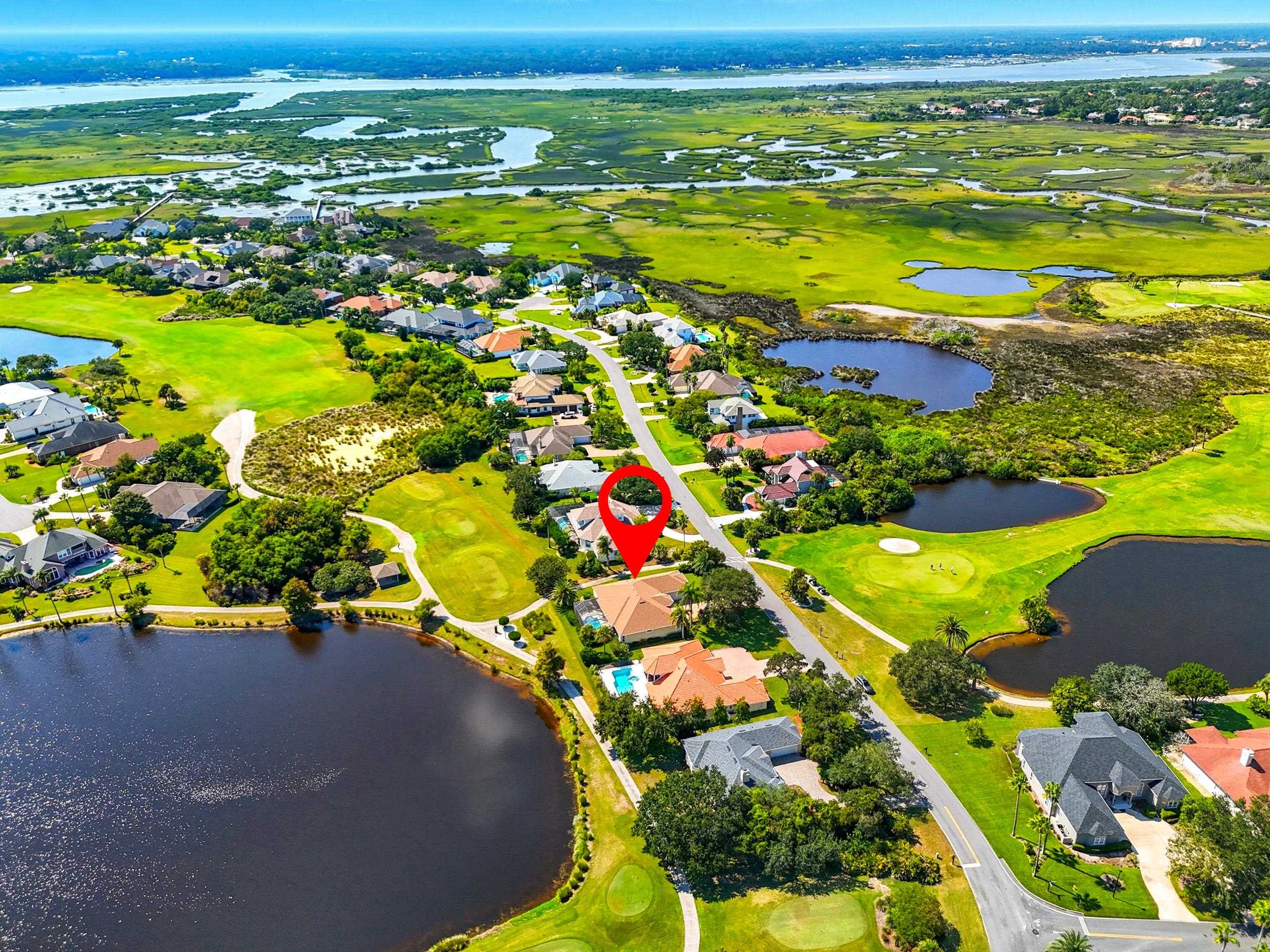 305 Marsh Point Circle St. Augustine, FL 32080 - Photo 69 of 82 Aerial overview of property's location featuring a golf club, nearby suburban area, and a nearby body of water