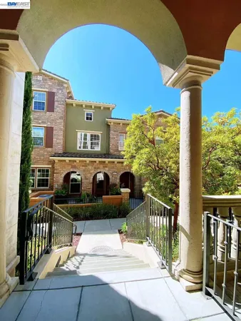 a picture of a table and chairs in the balcony