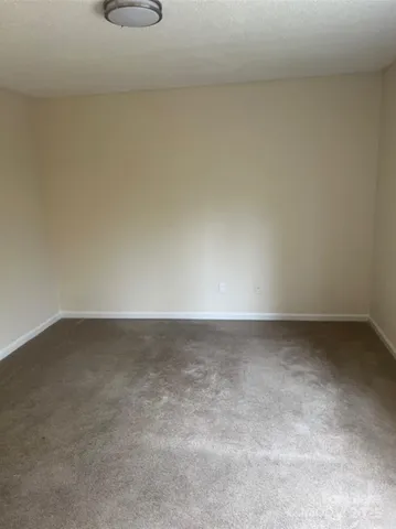 a view of a refrigerator in a room