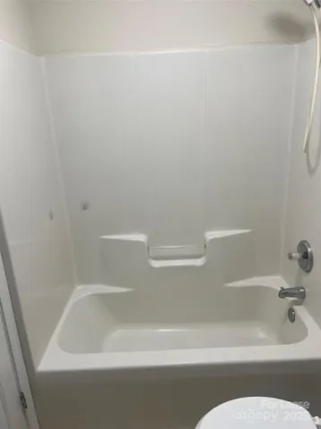a bathroom with bathtub
