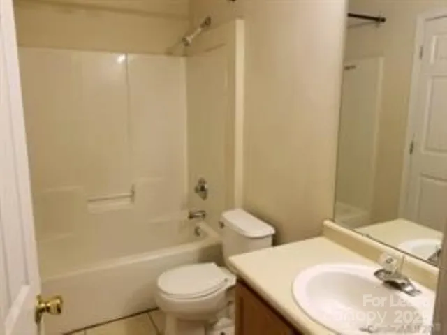 a bathroom with a sink and toilet