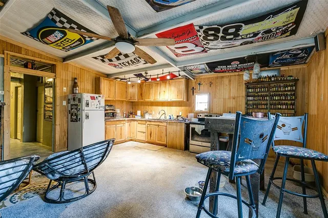 a bedroom with a bed and cabinets