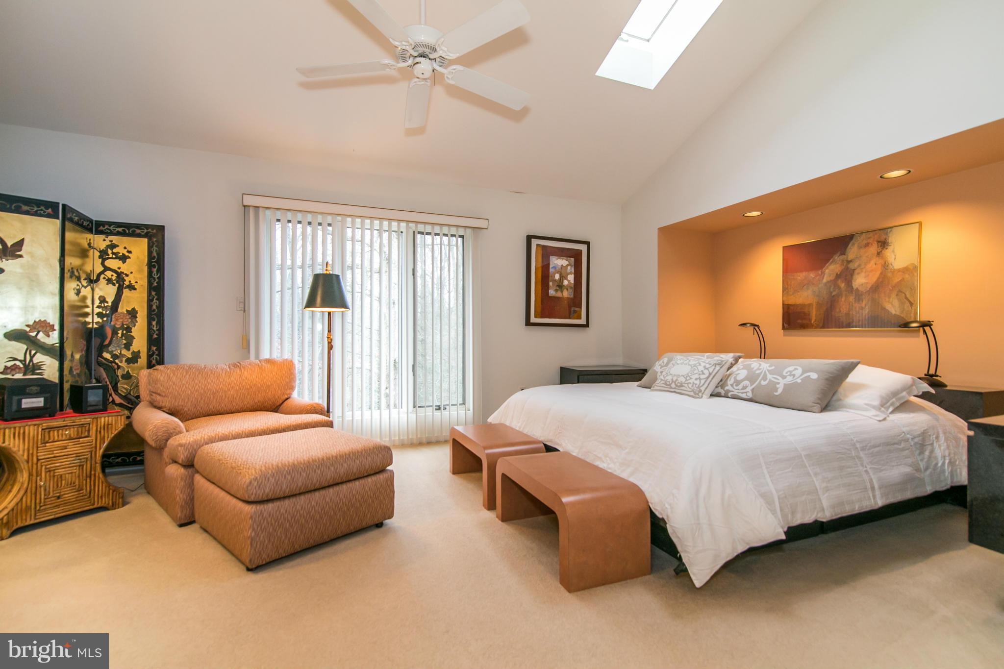 11915 State Rte 4707 Reston, VA 20191 - Photo 16 of 30 a bedroom with a bed couch and window